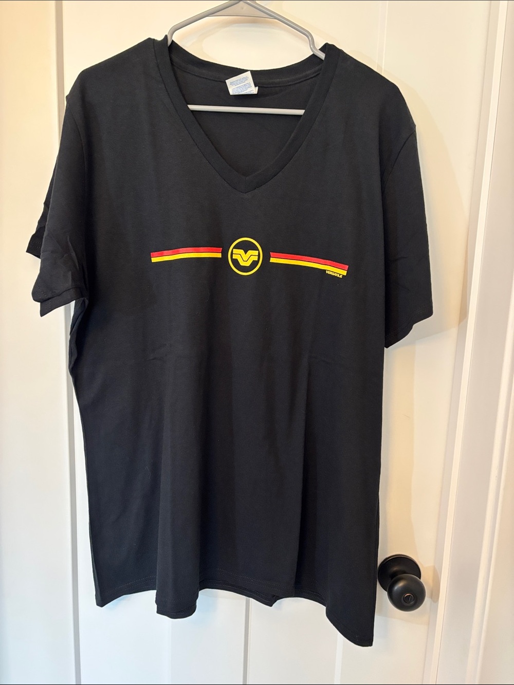 Black Versatile Tractor V-Neck Short Sleeve Tee with Yellow & Red Stripe Graphic